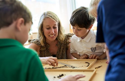 teacher with early childhood students in class