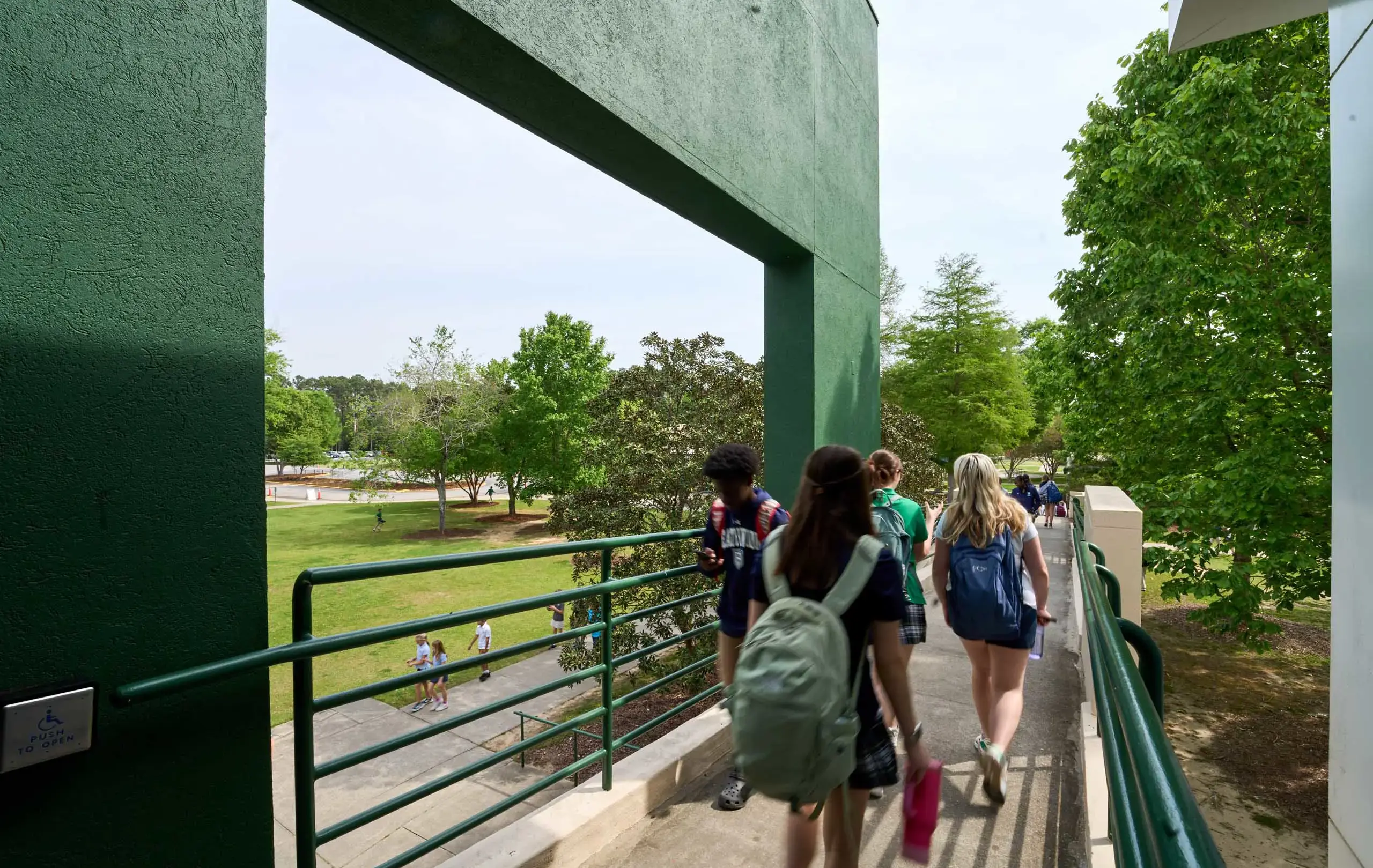 Students walking on bridge