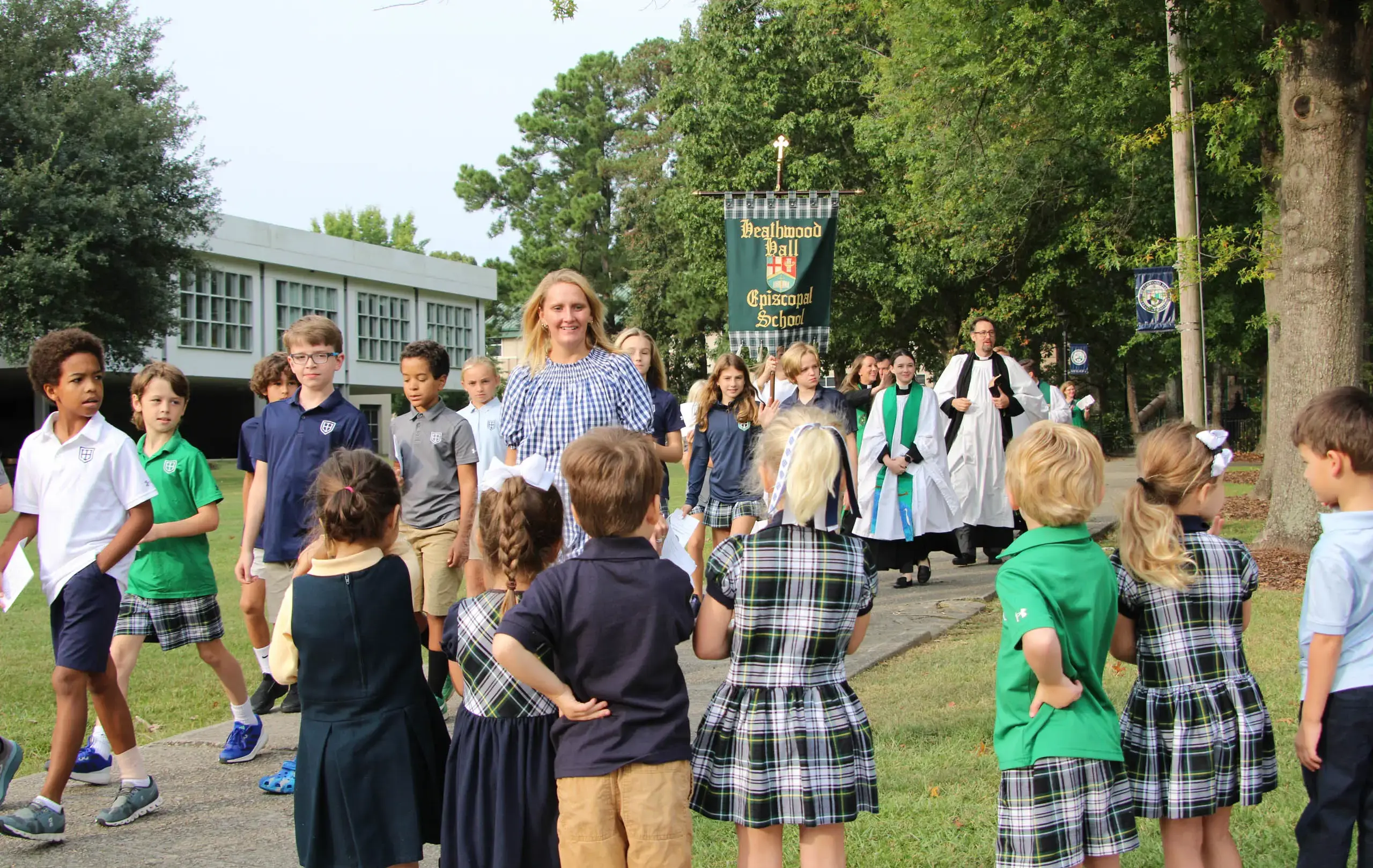 Teacher greeting children